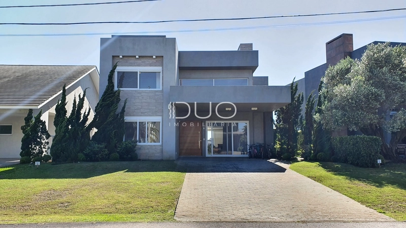 SOBRADO NO CONDOMÍNIO ENSEADA LAGOS EM XANGRI-LÁ: 3ª foto da galeria de imagens do imóvel