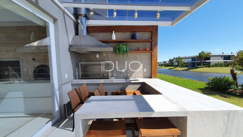 SOBRADO NO CONDOMÍNIO ENSEADA LAGOS EM XANGRI-LÁ: 35ª foto da galeria de imagens do imóvel