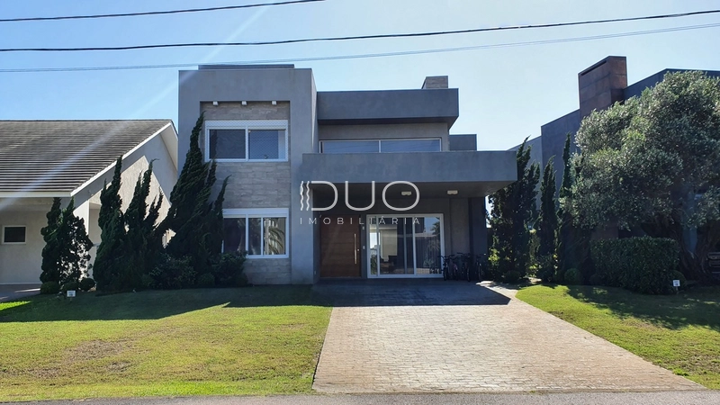 SOBRADO NO CONDOMÍNIO ENSEADA LAGOS EM XANGRI-LÁ: 2ª foto da galeria de imagens do imóvel