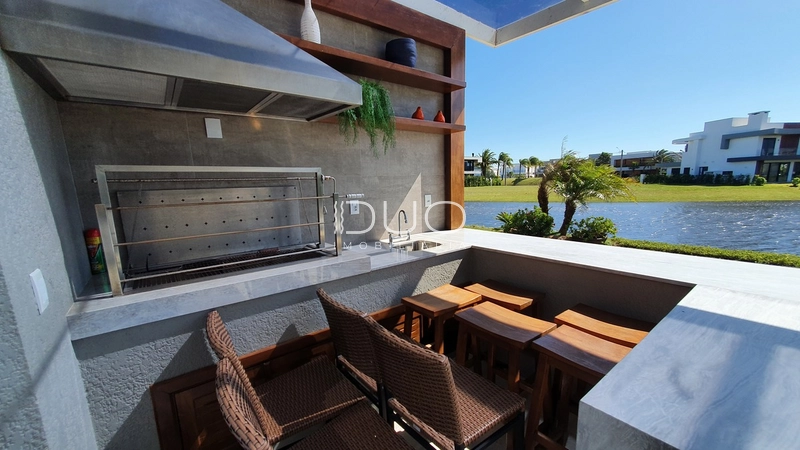 SOBRADO NO CONDOMÍNIO ENSEADA LAGOS EM XANGRI-LÁ: 37ª foto da galeria de imagens do imóvel