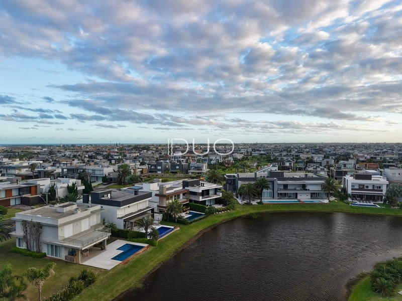 SOBRADO NO CONDOMÍNIO ENSEADA LAGOS EM XANGRI-LÁ: 48ª foto da galeria de imagens do imóvel