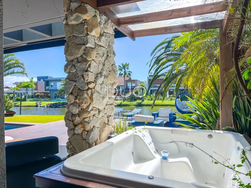 CASA COM 5 DORMITÓRIOS NO CONDOMÍNIO VILLAGIO DE ATLANTIDA: 16ª foto da galeria de imagens do imóvel