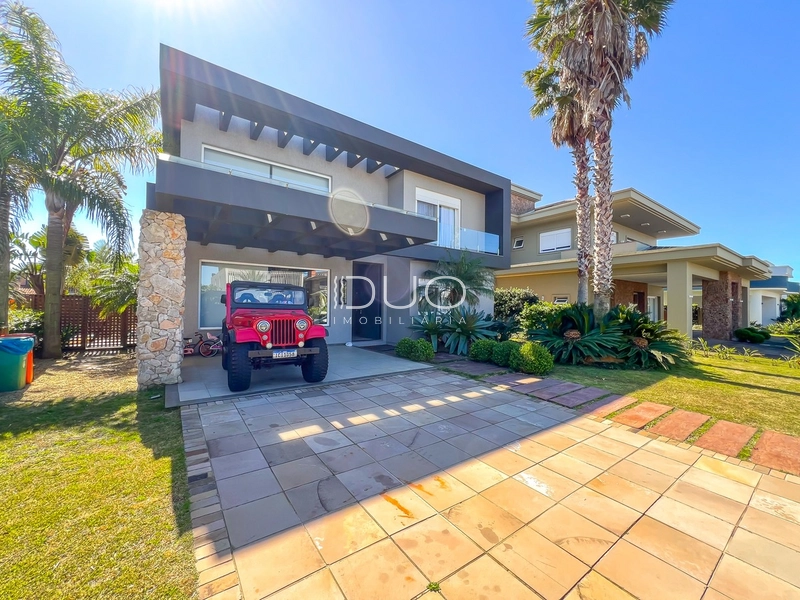 CASA COM 5 DORMITÓRIOS NO CONDOMÍNIO VILLAGIO DE ATLANTIDA