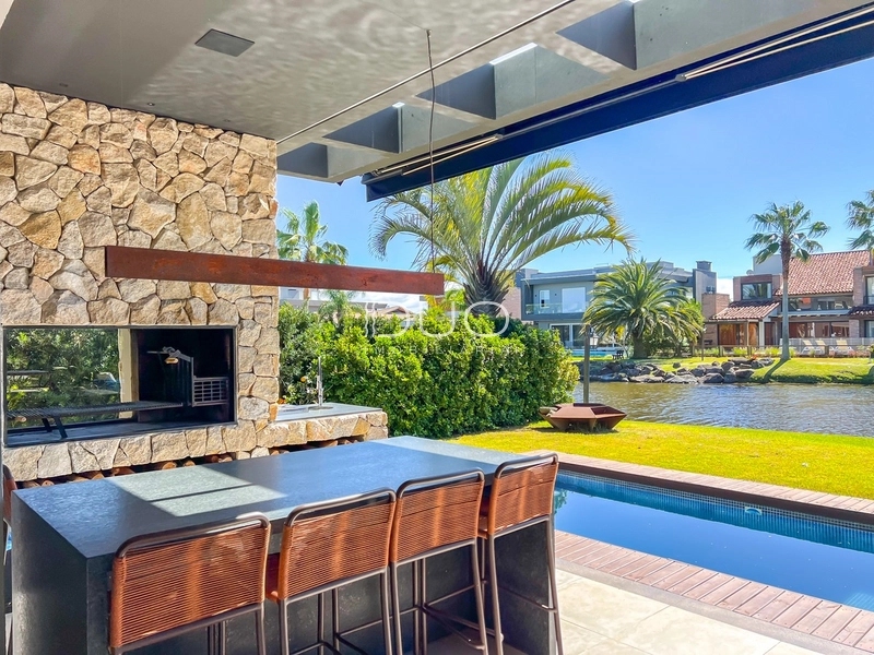 CASA COM 5 DORMITÓRIOS NO CONDOMÍNIO VILLAGIO DE ATLANTIDA: 11ª foto da galeria de imagens do imóvel