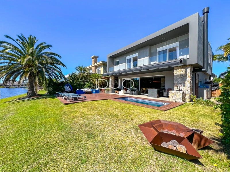 CASA COM 5 DORMITÓRIOS NO CONDOMÍNIO VILLAGIO DE ATLANTIDA: 12ª foto da galeria de imagens do imóvel