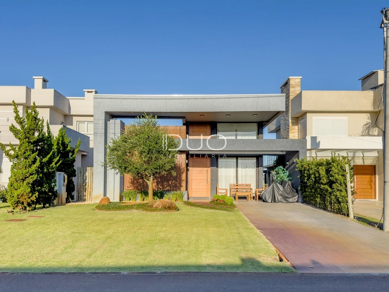 CASA COM 4 DORMITÓRIOS NO CONDOMÍNIO RIVIERA