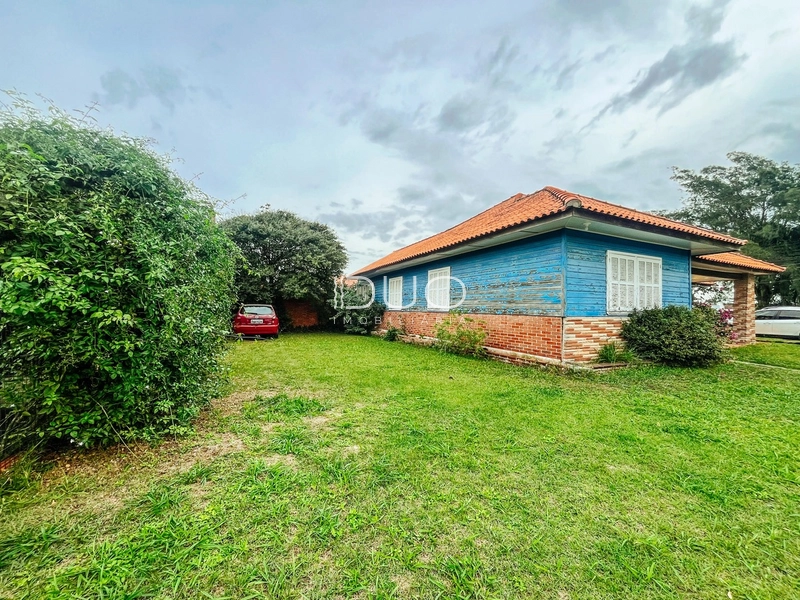 CASA COM 4 DORMITÓRIOS EM CAPÃO DA CANOA: 3ª foto da galeria de imagens do imóvel