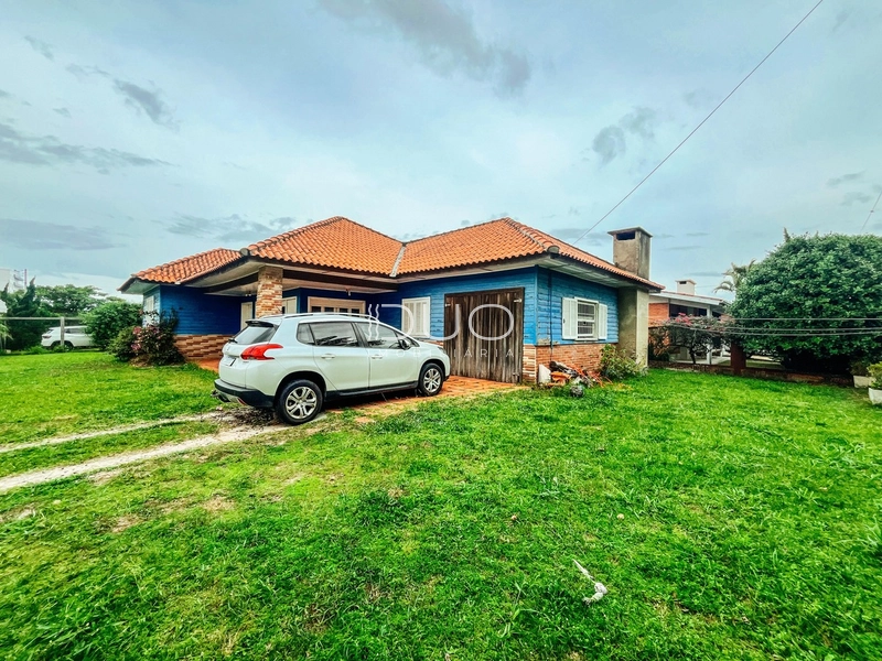 CASA COM 4 DORMITÓRIOS EM CAPÃO DA CANOA: 2ª foto da galeria de imagens do imóvel