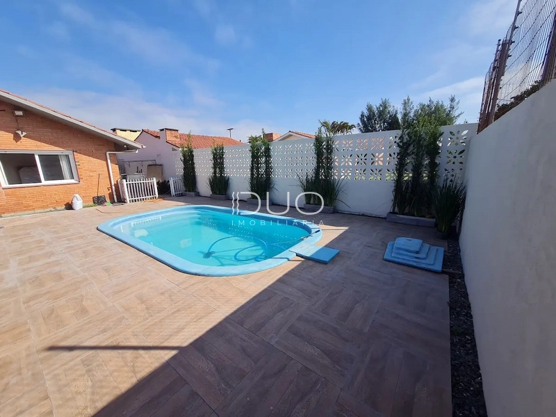 CASA COM 4 DORMITÓRIOS NO BAIRRO ATLÂNTIDA