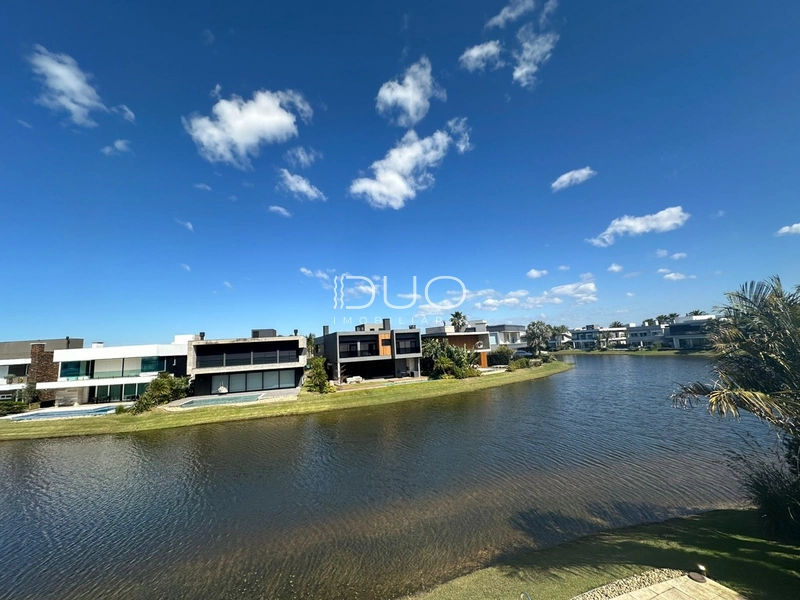 SOBRADO NO CONDOMÍNIO ENSEADA LAGOS EM XANGRI-LÁ: 35ª foto da galeria de imagens do imóvel