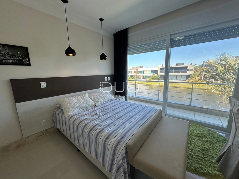 SOBRADO NO CONDOMÍNIO ENSEADA LAGOS EM XANGRI-LÁ: 18ª foto da galeria de imagens do imóvel