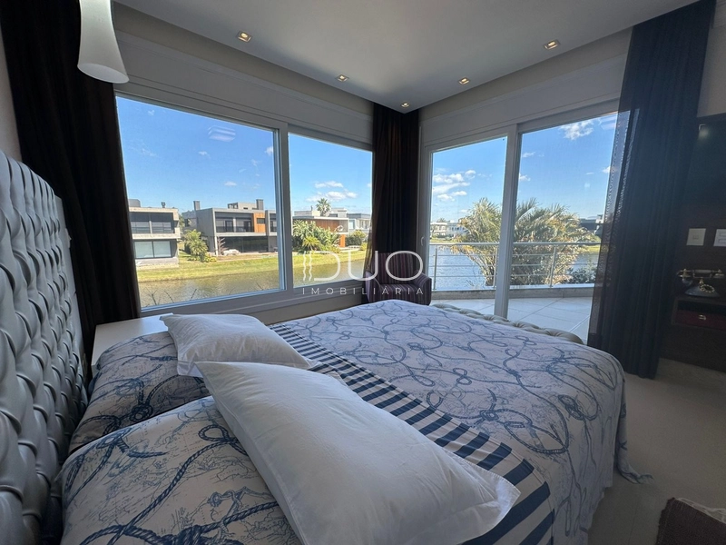 SOBRADO NO CONDOMÍNIO ENSEADA LAGOS EM XANGRI-LÁ: 20ª foto da galeria de imagens do imóvel