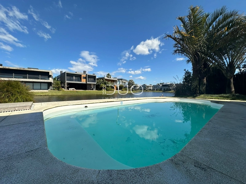 SOBRADO NO CONDOMÍNIO ENSEADA LAGOS EM XANGRI-LÁ: 13ª foto da galeria de imagens do imóvel