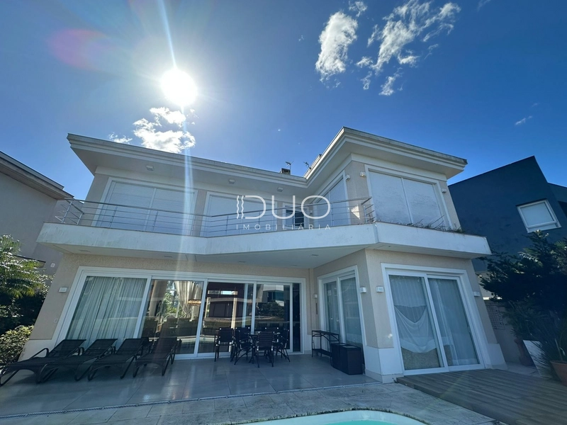 SOBRADO NO CONDOMÍNIO ENSEADA LAGOS EM XANGRI-LÁ: 3ª foto da galeria de imagens do imóvel