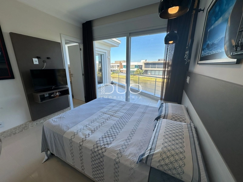 SOBRADO NO CONDOMÍNIO ENSEADA LAGOS EM XANGRI-LÁ: 23ª foto da galeria de imagens do imóvel