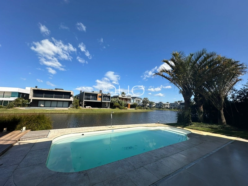 SOBRADO NO CONDOMÍNIO ENSEADA LAGOS EM XANGRI-LÁ: 12ª foto da galeria de imagens do imóvel