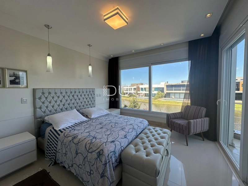 SOBRADO NO CONDOMÍNIO ENSEADA LAGOS EM XANGRI-LÁ: 21ª foto da galeria de imagens do imóvel