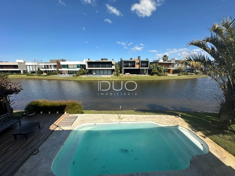 SOBRADO NO CONDOMÍNIO ENSEADA LAGOS EM XANGRI-LÁ: 34ª foto da galeria de imagens do imóvel