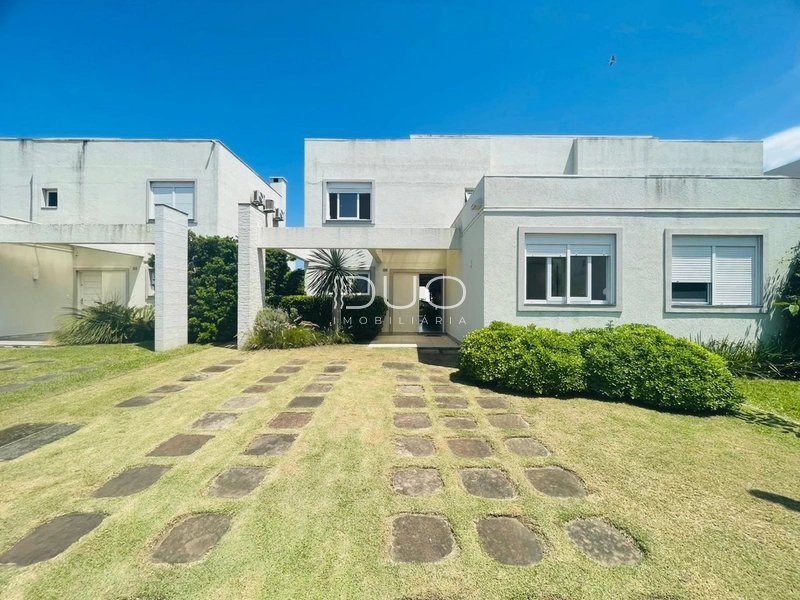 SOBRADO NO CONDOMÍNIO PATEO MARBELLA EM XANGRI-LÁ: 3ª foto da galeria de imagens do imóvel