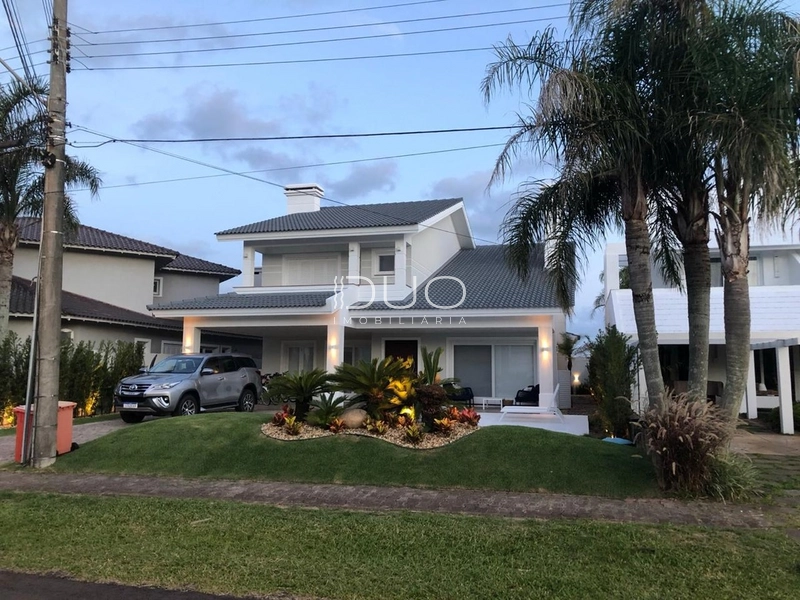 SOBRADO NO CONDOMÍNIO ATLÂNTIDA LAGOS PARK EM XANGRI-LÁ: 3ª foto da galeria de imagens do imóvel