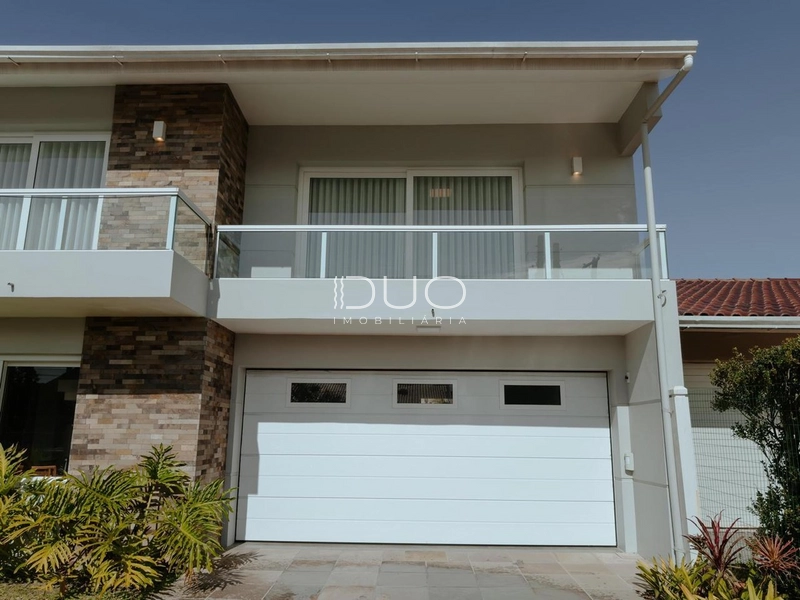 SOBRADO COM 3 SUÍTES EM XANGRI-LÁ: 2ª foto da galeria de imagens do imóvel