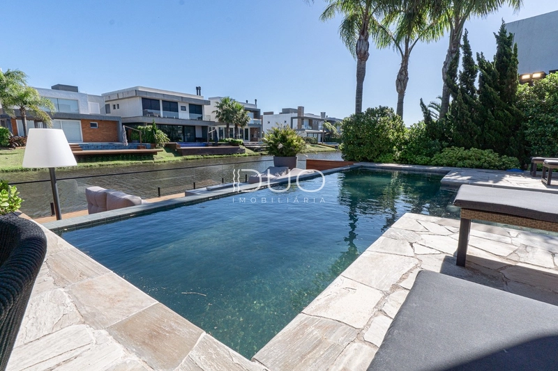 CASA COM 5 DORMITÓRIOS NO CONDOMÍNIO MALIBU: 4ª foto da galeria de imagens do imóvel