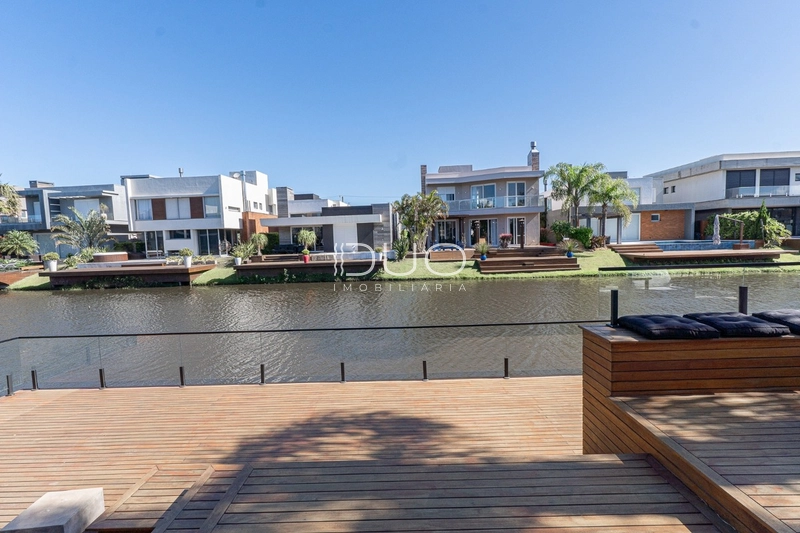 CASA COM 5 DORMITÓRIOS NO CONDOMÍNIO MALIBU: 3ª foto da galeria de imagens do imóvel