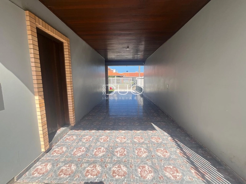 CASA COM 4 DORMITÓRIOS EM XANGRI-LÁ: 3ª foto da galeria de imagens do imóvel