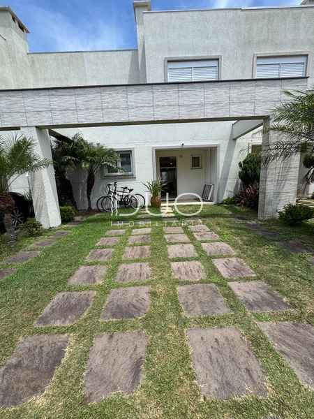 SOBRADO NO CONDOMÍNIO PATEO MARBELLA EM XANGRI-LÁ: 3ª foto da galeria de imagens do imóvel