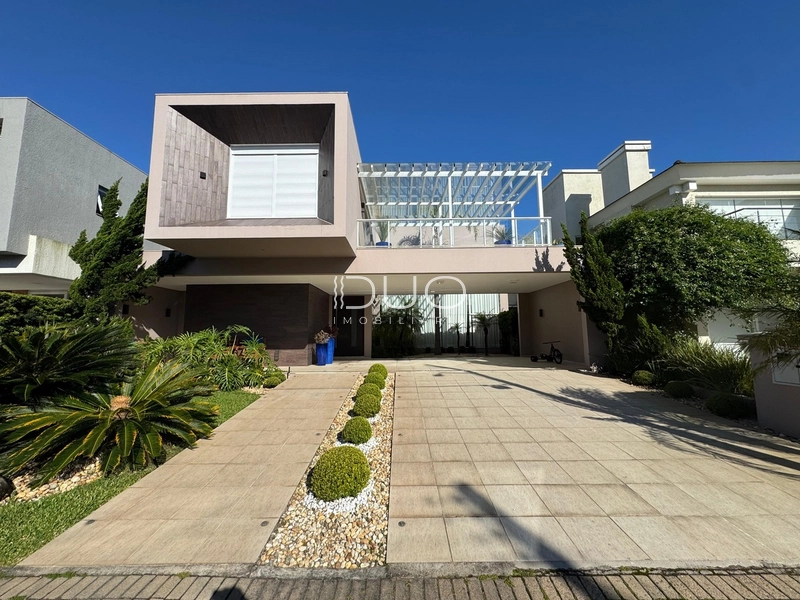 CASA COM 4 DORMITÓRIOS NO CONDOMÍNIO VELAS DA MARINA