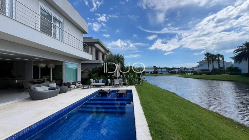 SOBRADO NO CONDOMÍNIO ENSEADA LAGOS EM XANGRI-LÁ: 23ª foto da galeria de imagens do imóvel