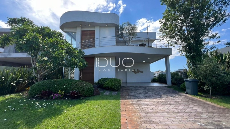 SOBRADO NO CONDOMÍNIO ENSEADA LAGOS EM XANGRI-LÁ: 2ª foto da galeria de imagens do imóvel