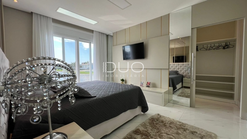 SOBRADO NO CONDOMÍNIO ENSEADA LAGOS EM XANGRI-LÁ: 36ª foto da galeria de imagens do imóvel