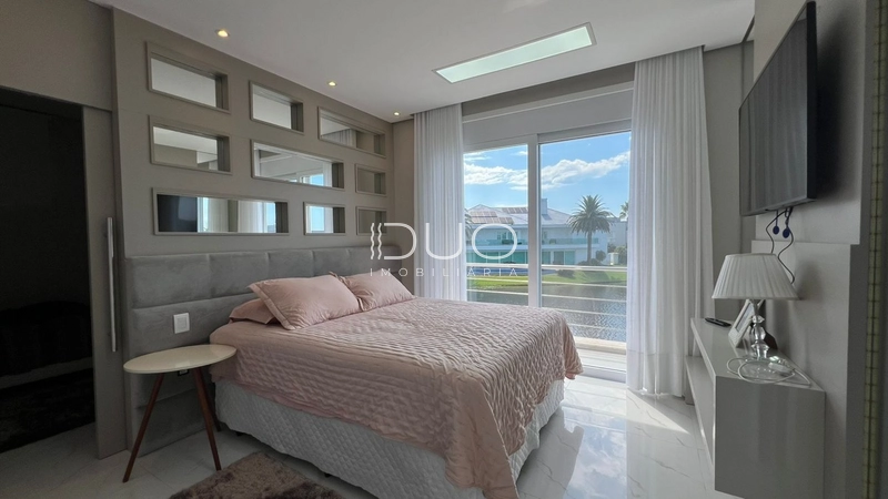 SOBRADO NO CONDOMÍNIO ENSEADA LAGOS EM XANGRI-LÁ: 34ª foto da galeria de imagens do imóvel