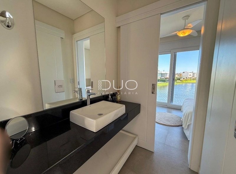 CASA COM 4 DORMITÓRIOS NO CONDOMÍNIO RIVIERA: 5ª foto da galeria de imagens do imóvel