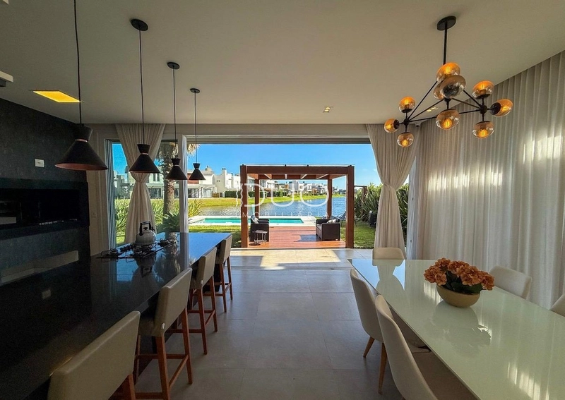 CASA COM 4 DORMITÓRIOS NO CONDOMÍNIO RIVIERA: 3ª foto da galeria de imagens do imóvel