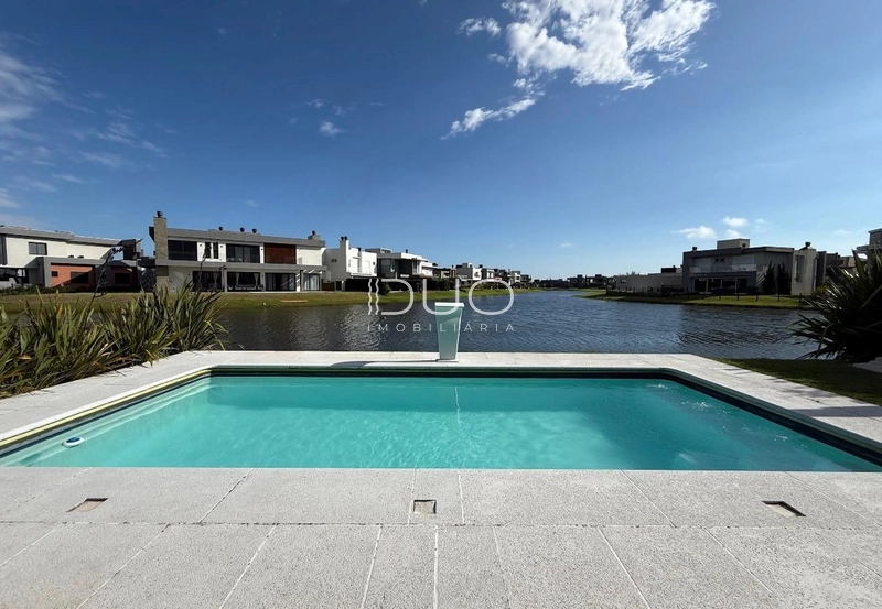 CASA COM 4 DORMITÓRIOS NO CONDOMÍNIO RIVIERA: 21ª foto da galeria de imagens do imóvel