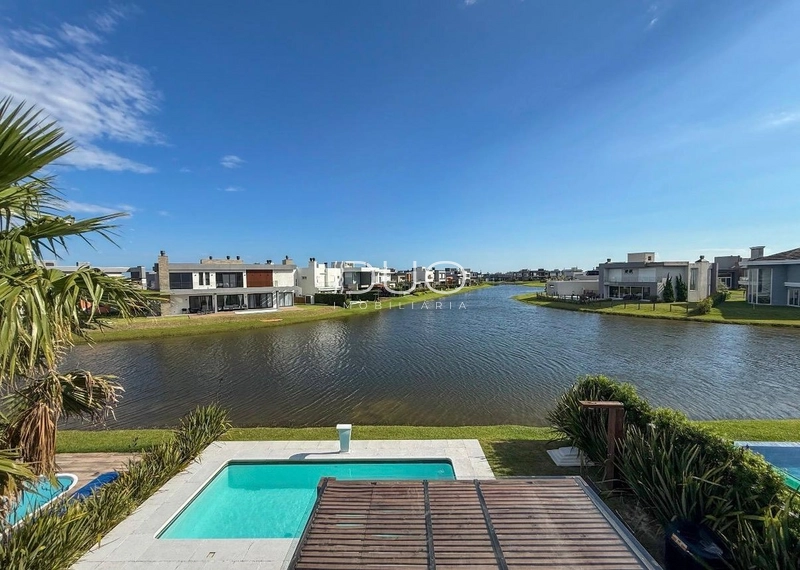 CASA COM 4 DORMITÓRIOS NO CONDOMÍNIO RIVIERA: 18ª foto da galeria de imagens do imóvel