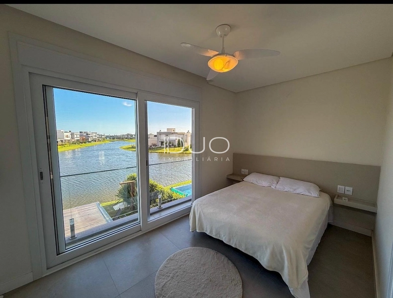 CASA COM 4 DORMITÓRIOS NO CONDOMÍNIO RIVIERA: 10ª foto da galeria de imagens do imóvel