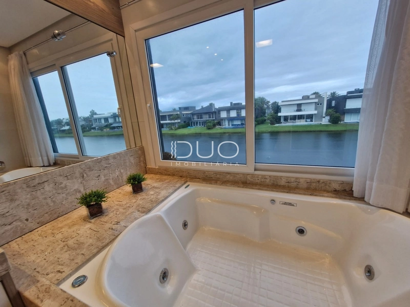 CASA COM 5 DORMITÓRIOS NO CONDOÍNIO ENSEADA LAGOS: 36ª foto da galeria de imagens do imóvel