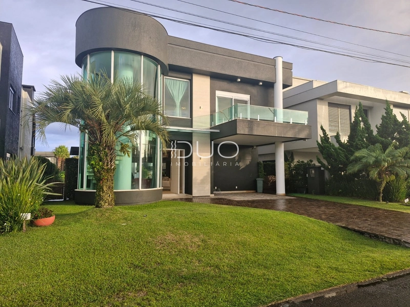 CASA COM 5 DORMITÓRIOS NO CONDOÍNIO ENSEADA LAGOS: 2ª foto da galeria de imagens do imóvel