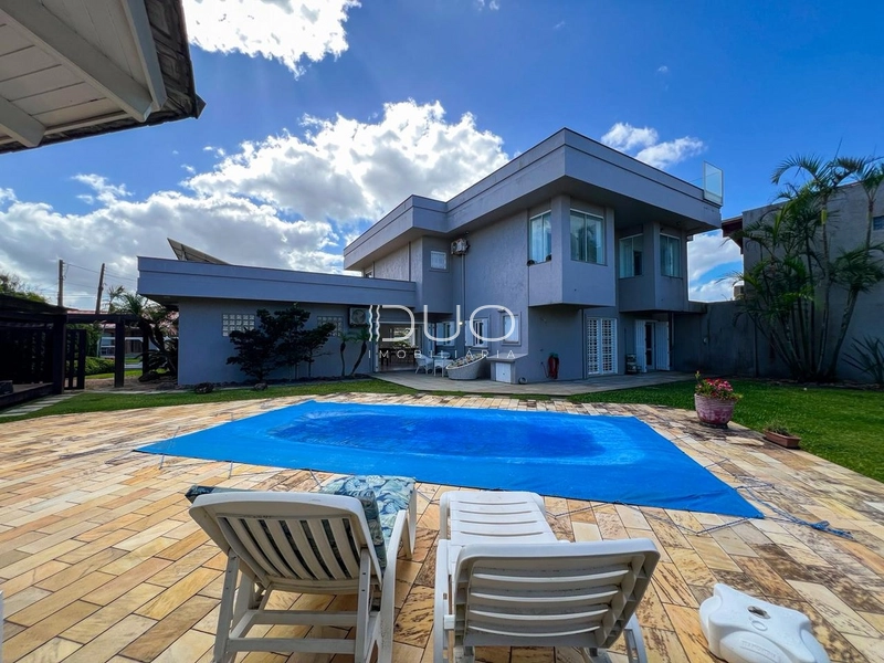 CASA COM 4 DORMITÓRIOS EM XANGRI-LÁ: 8ª foto da galeria de imagens do imóvel