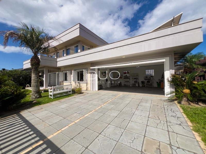 CASA COM 4 DORMITÓRIOS EM XANGRI-LÁ: 4ª foto da galeria de imagens do imóvel