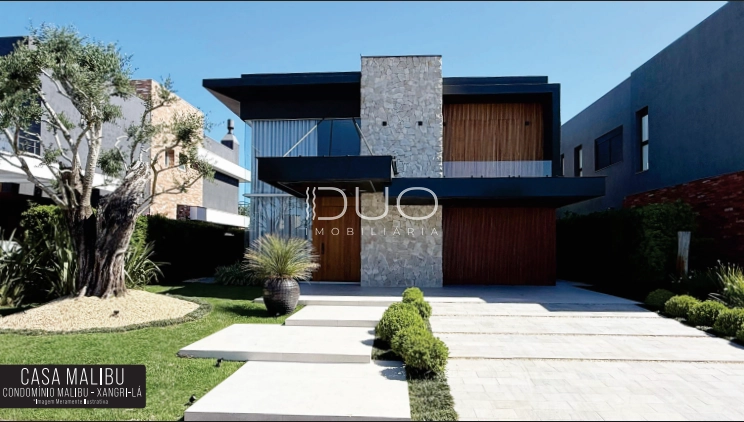 SOBRADO NO CONDOMÍNIO MALIBU EM XANGRI-LÁ: 2ª foto da galeria de imagens do imóvel