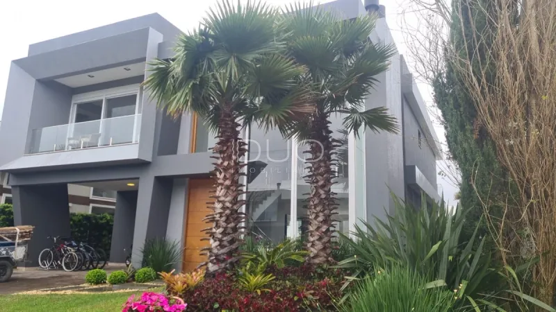 CASA NO CONDOMÍNIO ENSEADA EM XANGRI-LÁ: 4ª foto da galeria de imagens do imóvel