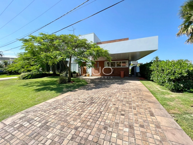 CASA NO CONDOMÍNIO ENSEADA LAGOS EM XANGRI-LÁ: 2ª foto da galeria de imagens do imóvel