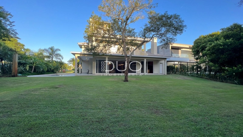 CASA NO CONDOMÍNIO BOSQUES DE ATLÂNTIDA EM CAPÃO DA CANOA: 36ª foto da galeria de imagens do imóvel