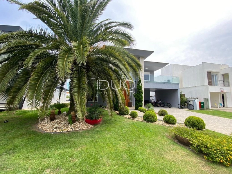 CASA NO CONDOMÍNIO VILLAGIO DE ATLÂNTIDA: 2ª foto da galeria de imagens do imóvel