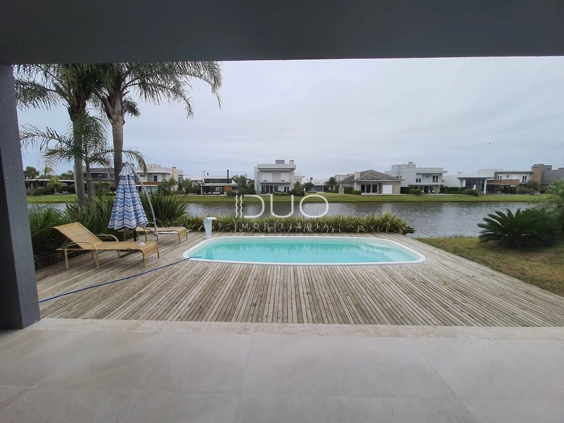 CASA NO CONDOMÍNIO ENSEADA LAGOS EM XANGRI-LÁ: 11ª foto da galeria de imagens do imóvel