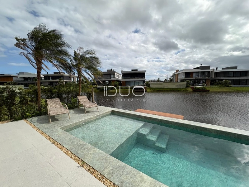 SOBRADO NO CONDOMÍNIO SENSE EM XANGRI-LÁ: 23ª foto da galeria de imagens do imóvel